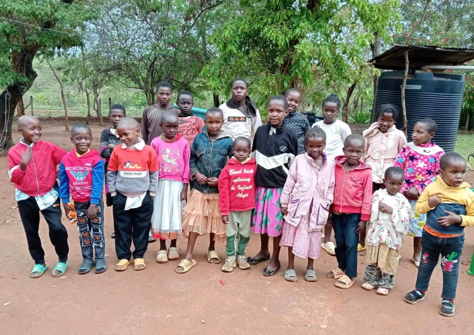 Kenyan families gathering in community support